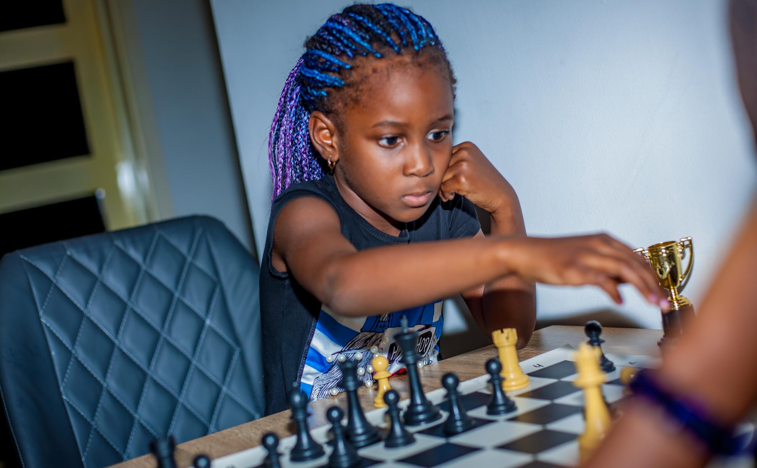 Young chess players developing their minds through chess and education